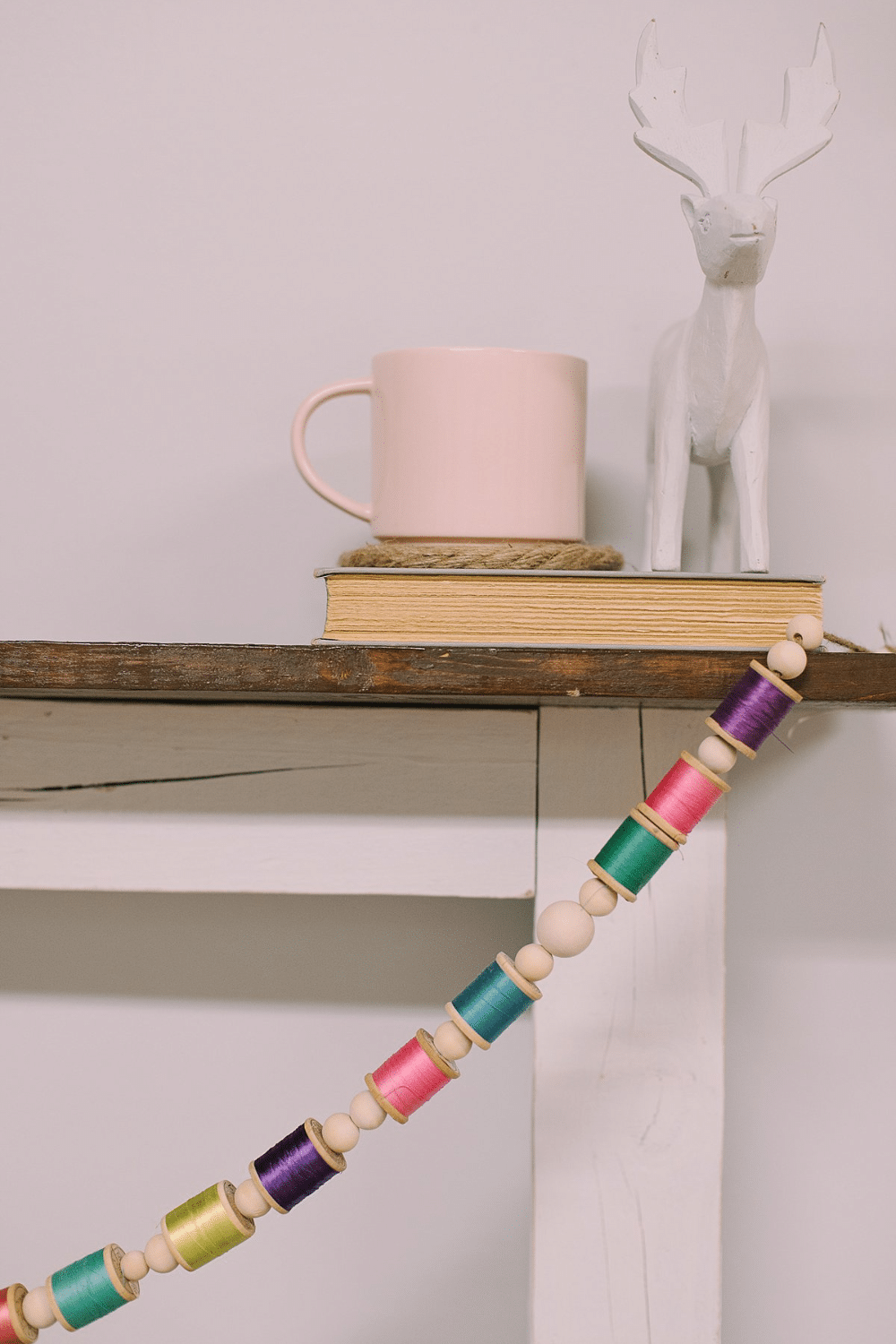 DIY Colorful Garland with Spools of Thread and Wooden Beads