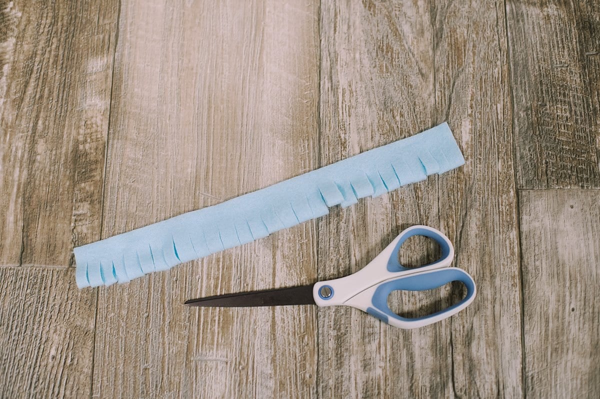 A strip of felt with fringe cut along the bottom.