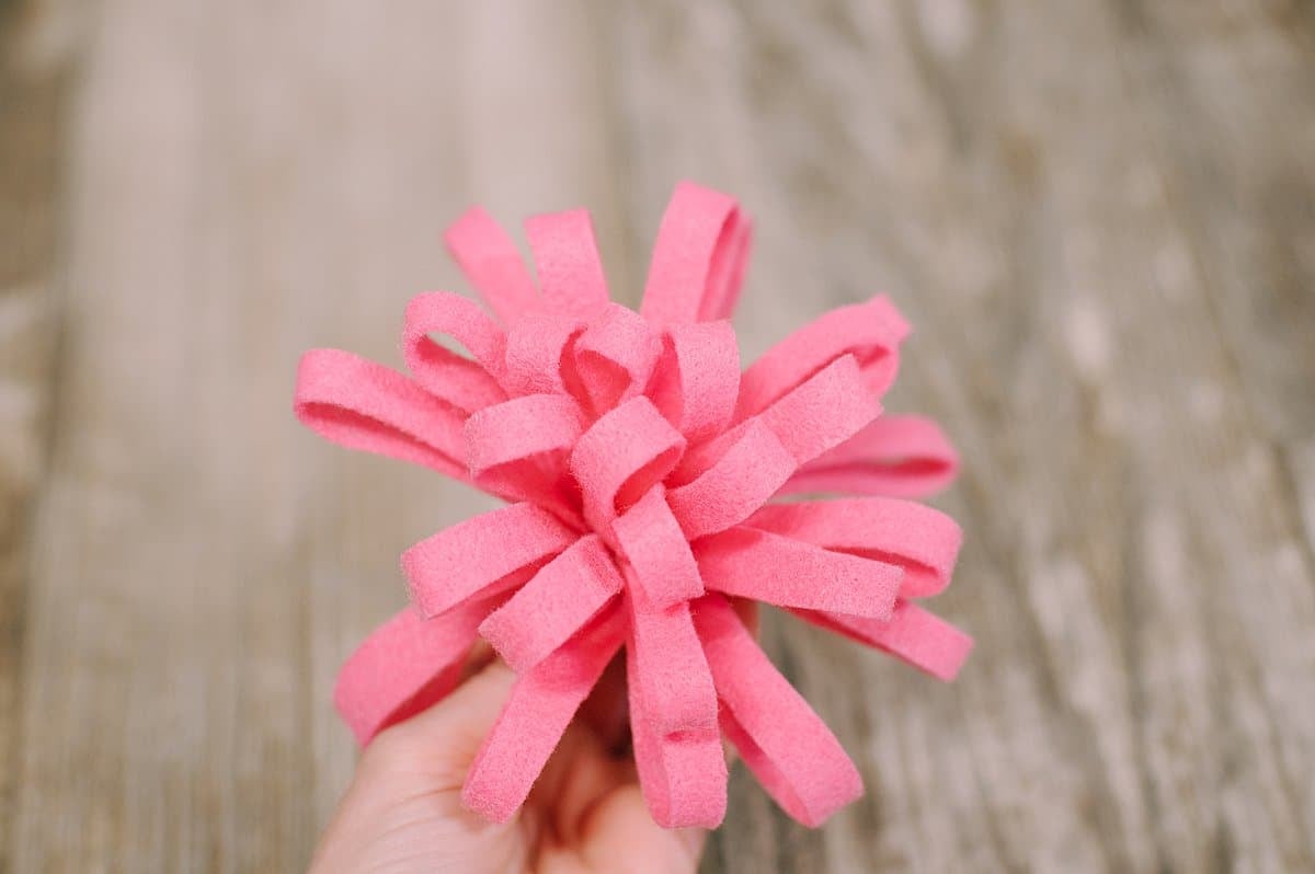 A loose, floppy felt mum flower.