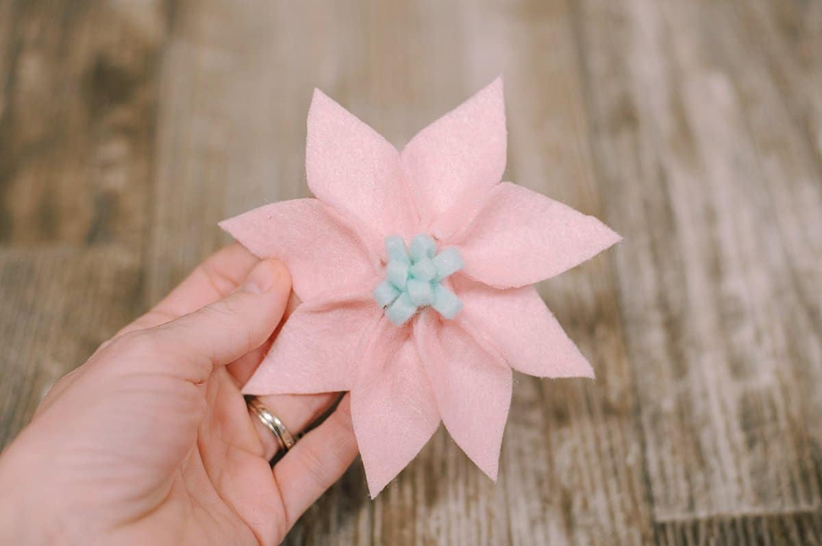 glue petals together and add a mum fringe to the center of the felt flower