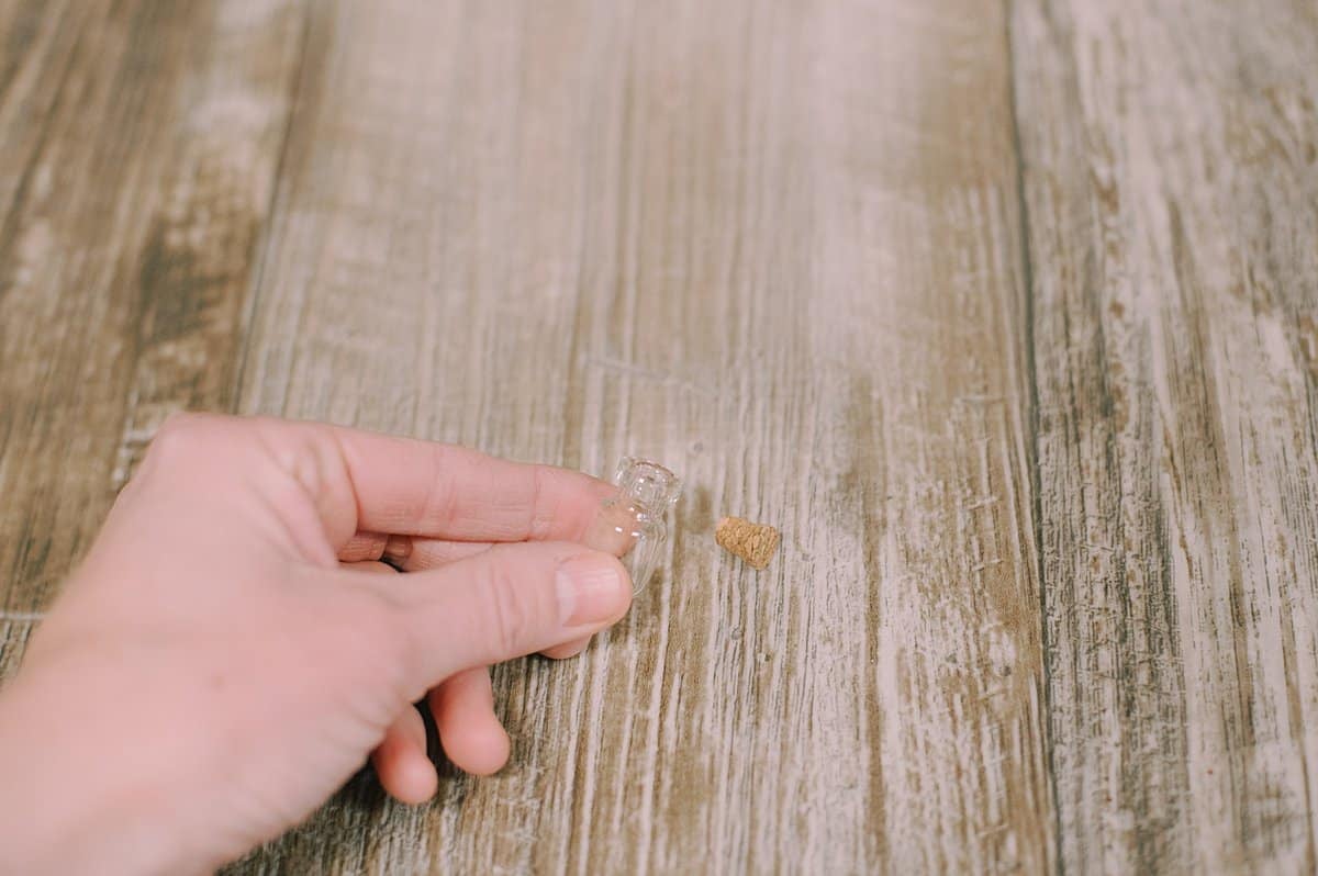 tiny glass jar with cork