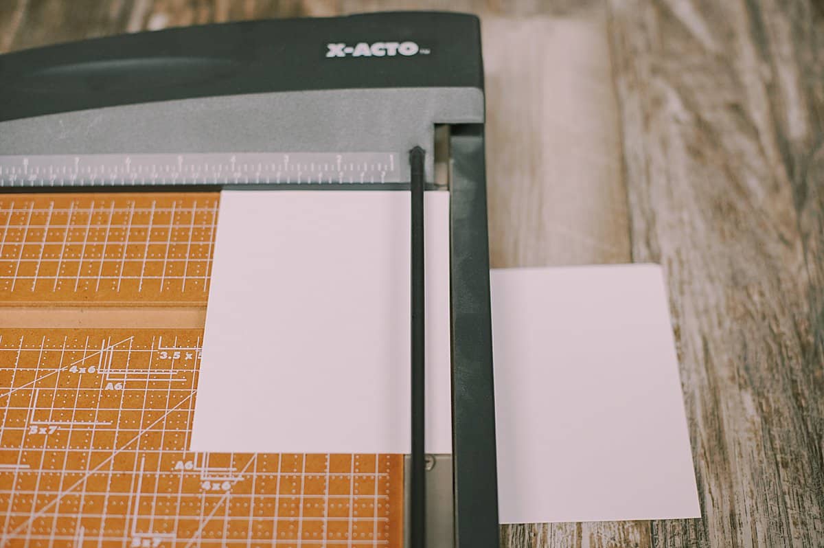 use paper cutter to cut paper for book