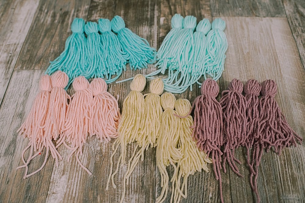 yarn tassels in pastel colors