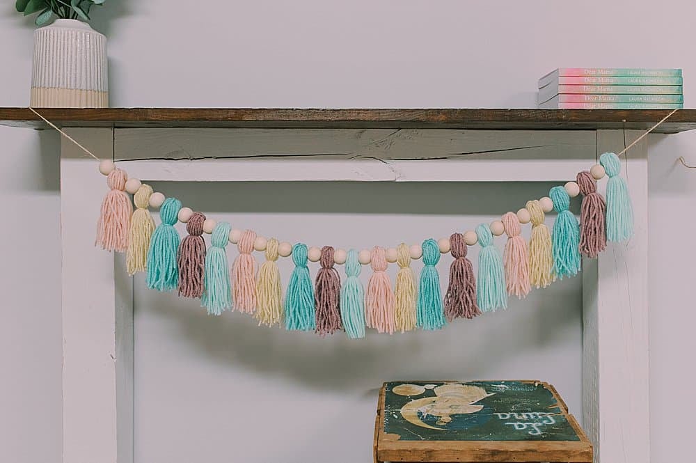 how to make yarn tassel garlands with pastel colored yarn