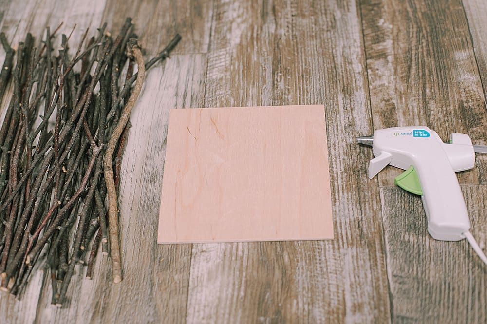 glue sticks to the base of a fairy house