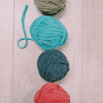 How to make DIY T-shirt yarn out of old worn-out shirts. Recycled t-shirts are upcycled into T-Shirt Yarn to use for new craft projects.