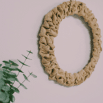 How to make a burlap ribbon wreath using a wire wreath form and burlap ribbon.