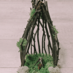 How to make a fairy house out of sticks and moss.