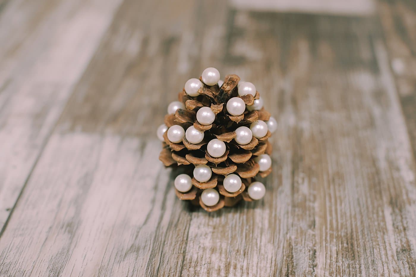 How to make a DIY pearl pine cone Christmas tree.