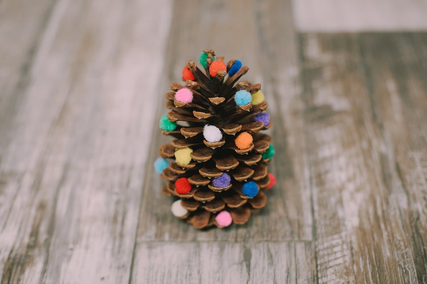 DIY Pom Pom Pinecone Christmas Trees.