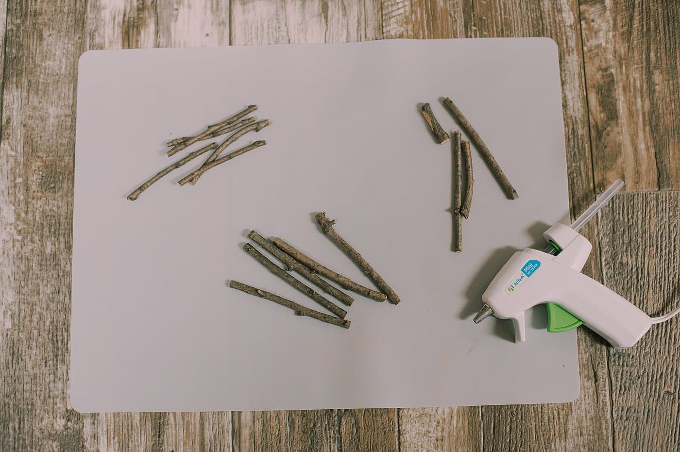 Cut sticks into small lengths to hot glue into christmas ornaments.