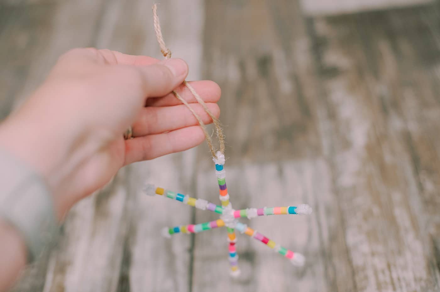 Your perler bead pipe cleaner snowflake is ready to hang.