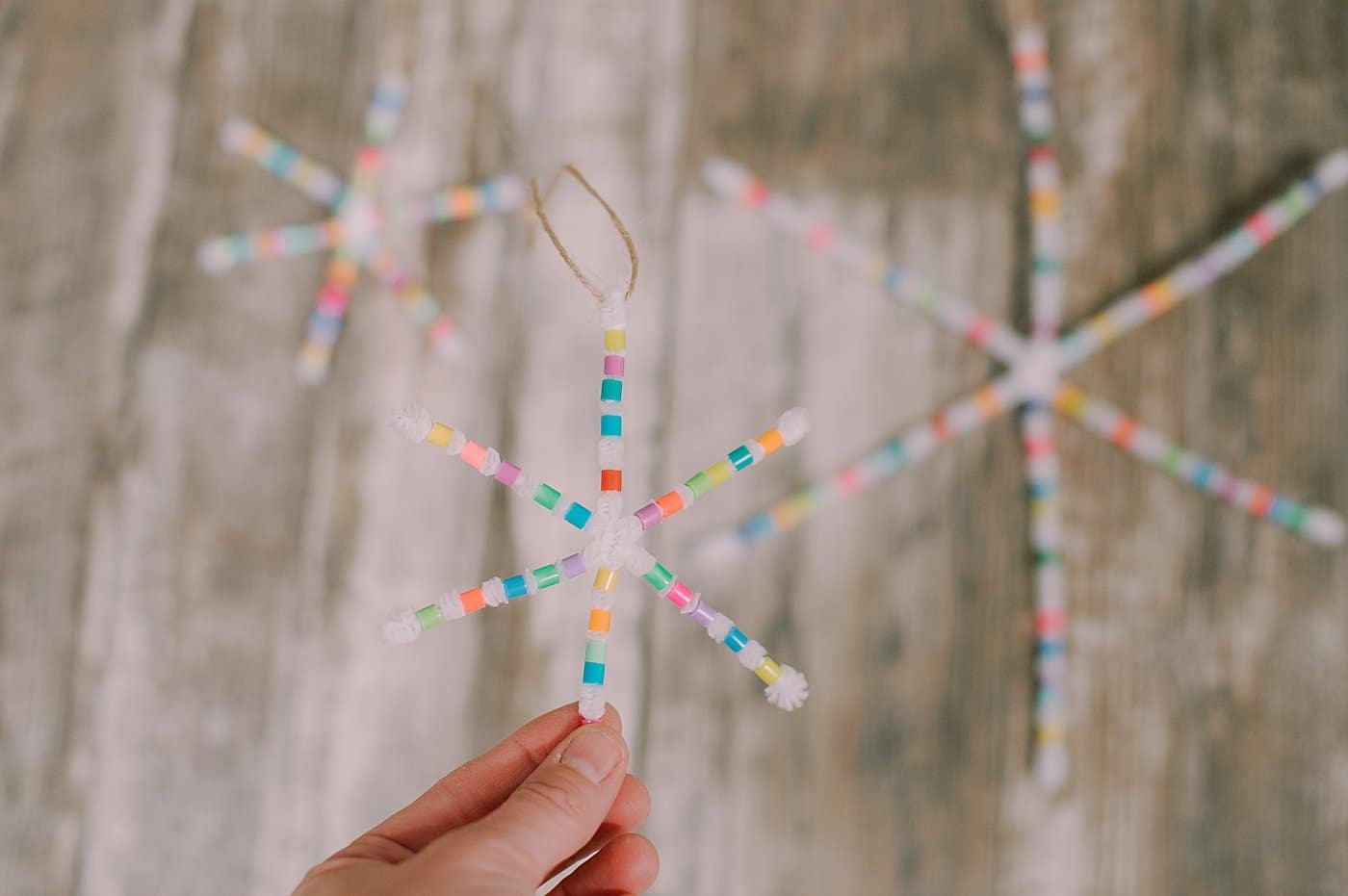 Your perler bead pipe cleaner snowflake is ready to hang.