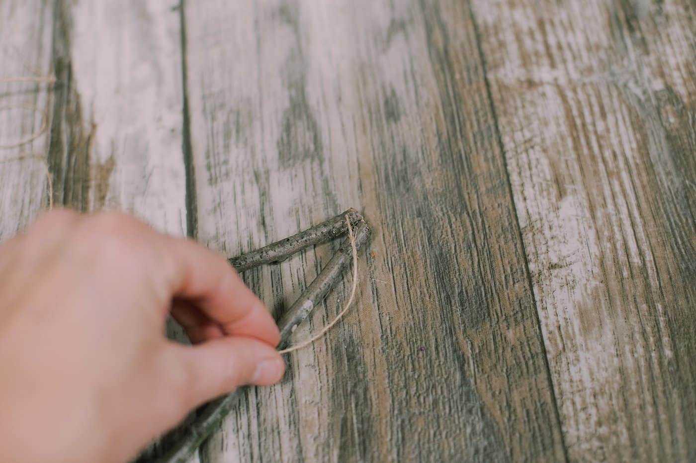 How to Make a Twine-Wrapped Stick Tree Ornament.