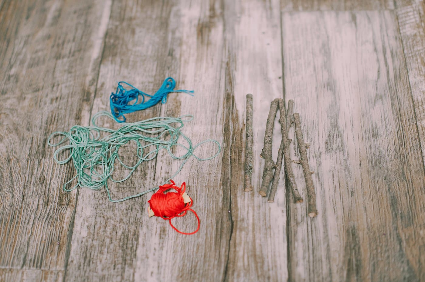 How to Make a Star Ornament out of Emboridery Floss Wrapped Sticks.