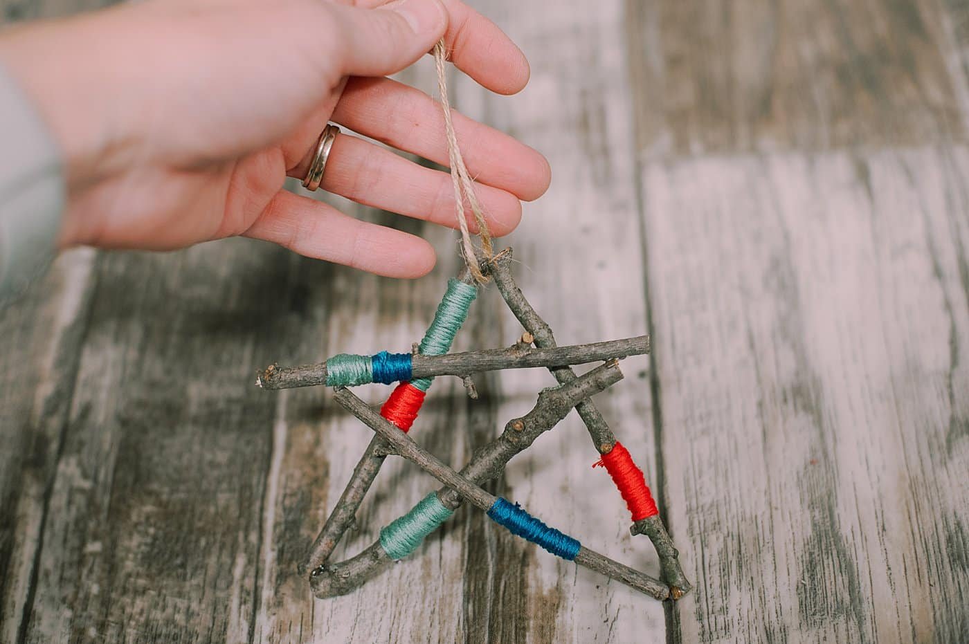 How to Make a Star Ornament out of Emboridery Floss Wrapped Sticks.