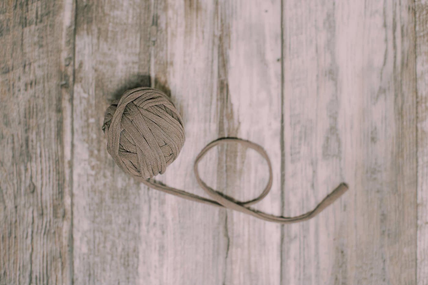 A ball of handmade t-shirt yarn.