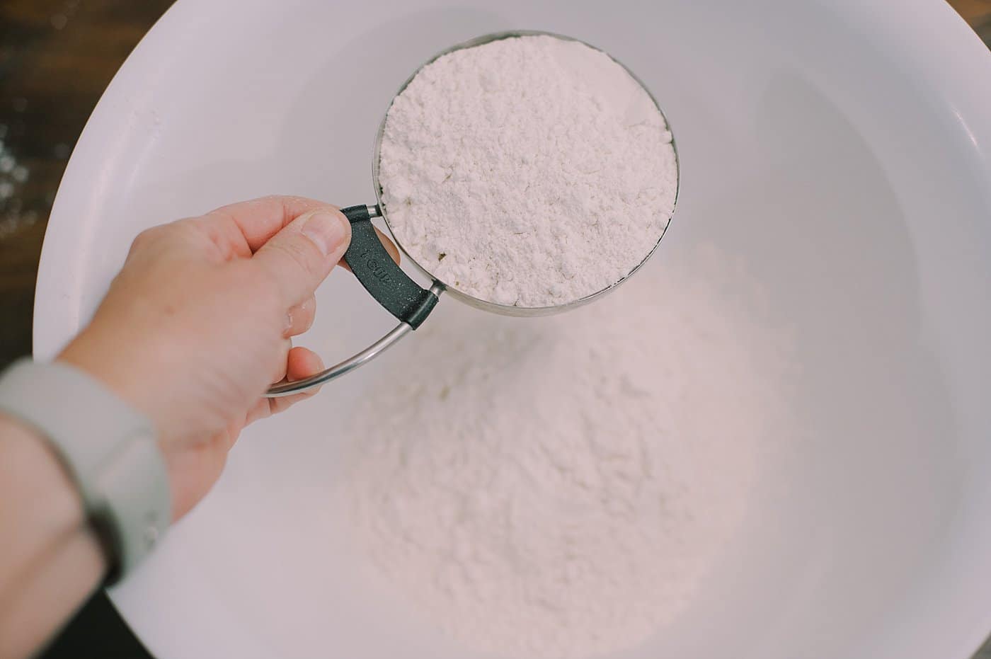 Add two cups of flour to a bowl.