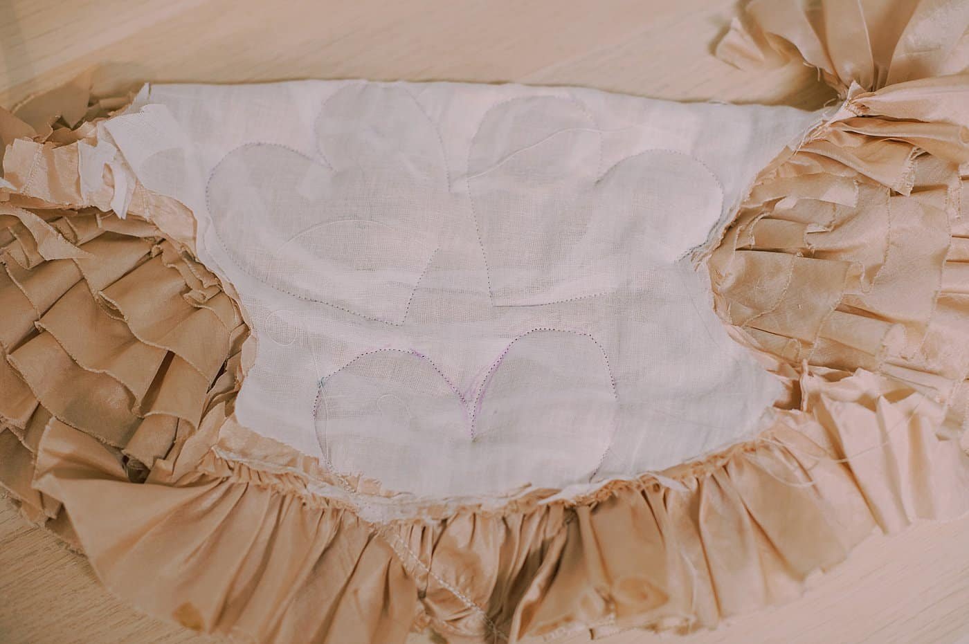 Draw hearts on the backside of the fabric.