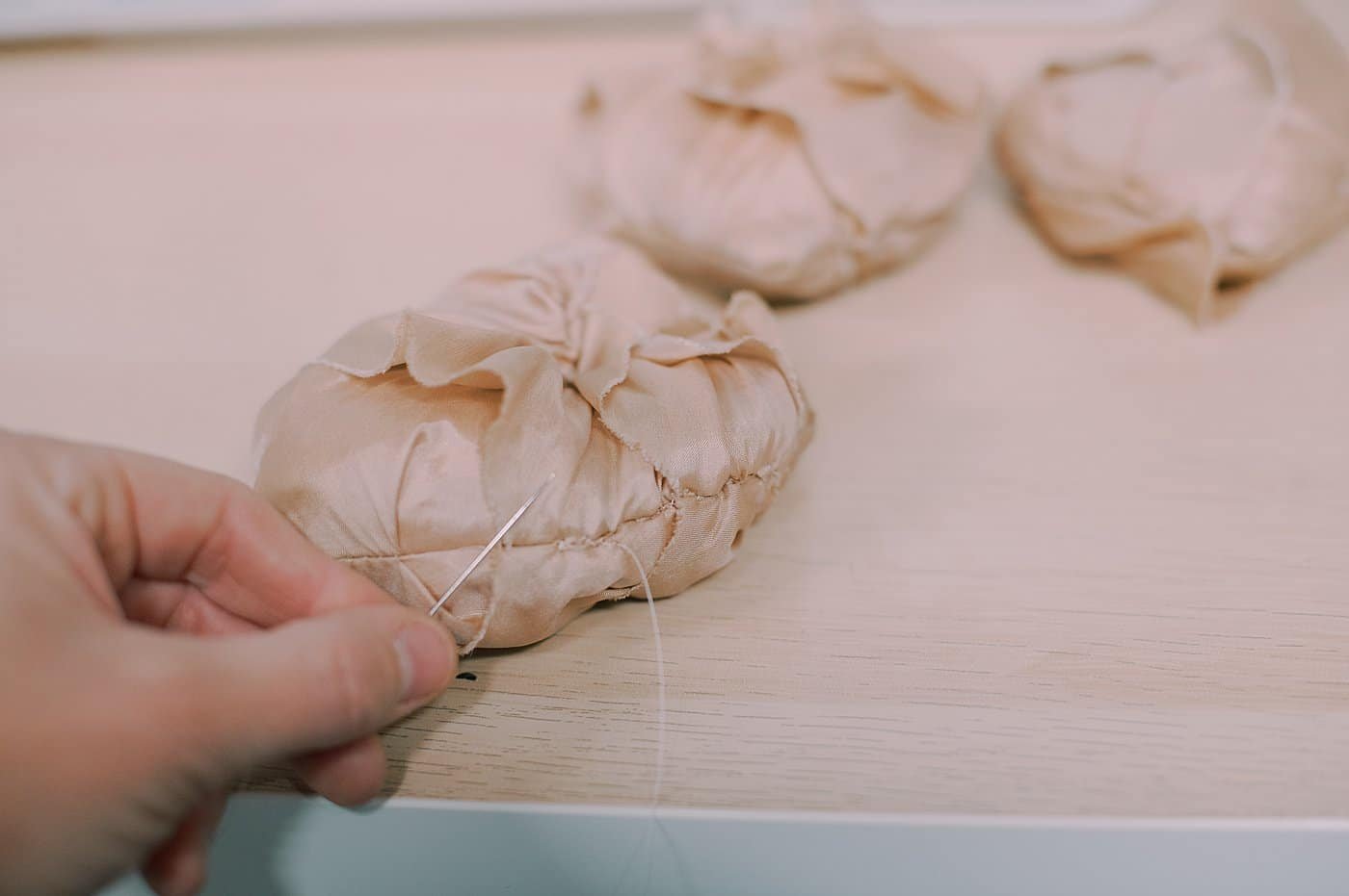 Sew up the turn hole in the ornament after stuffing it.