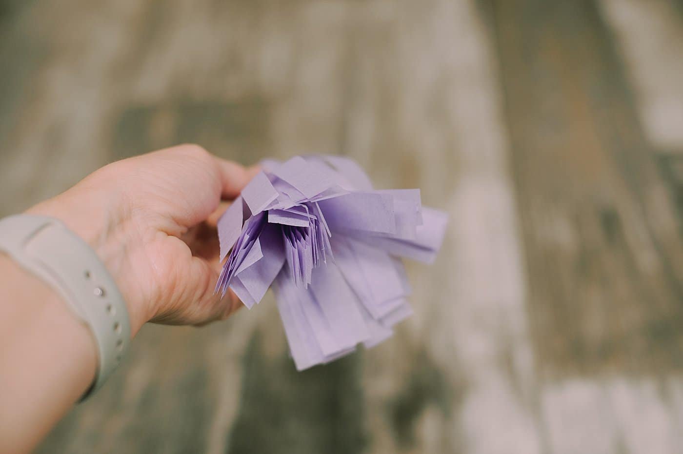 The bottom of a tissue paper tassel.