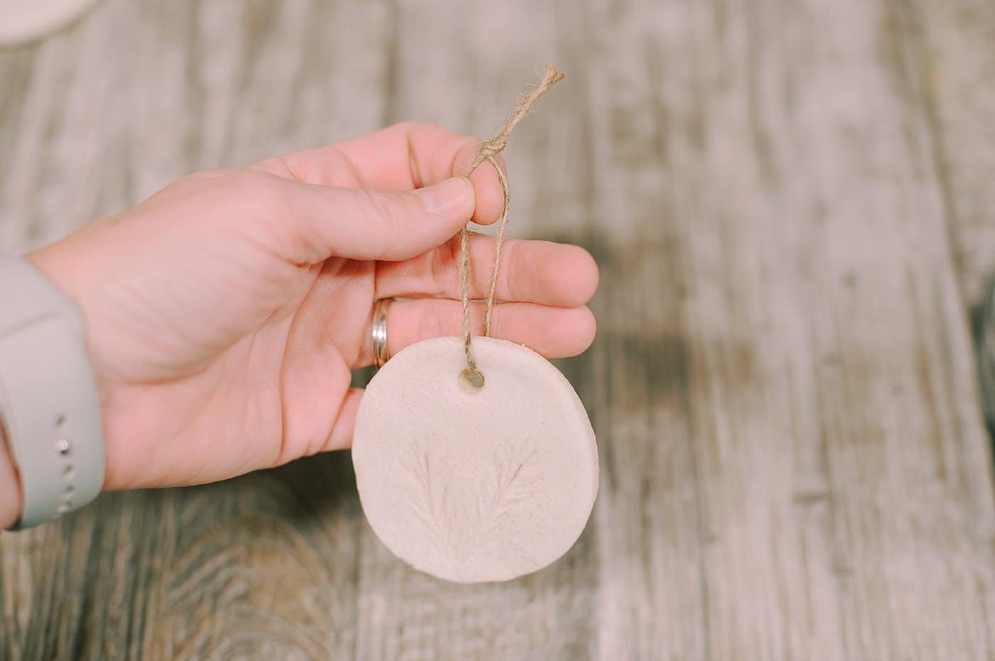 Add a twine hanging string to the salt dough ornament or salt dough gift tag.