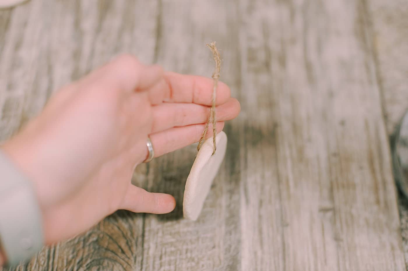 Add a twine hanging string to the salt dough ornament or salt dough gift tag.