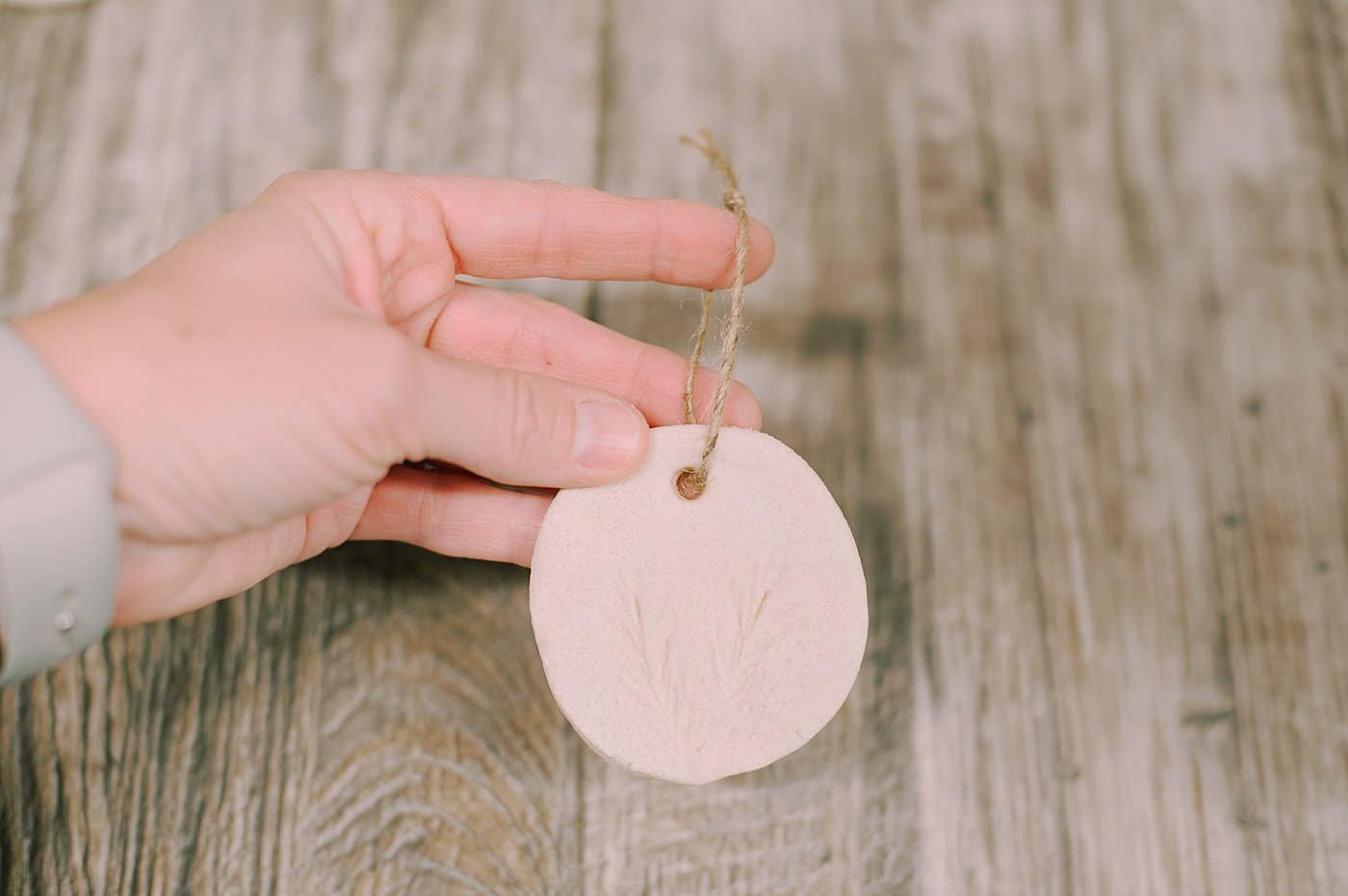 Add a twine hanging string to the salt dough ornament or salt dough gift tag.