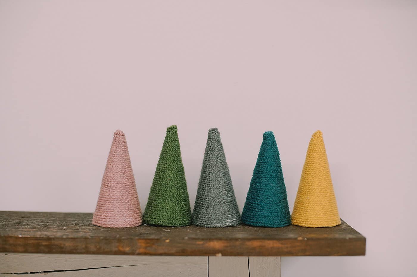 How to Make Yarn-Wrapped Syrofoam Cone Trees for Christmas.