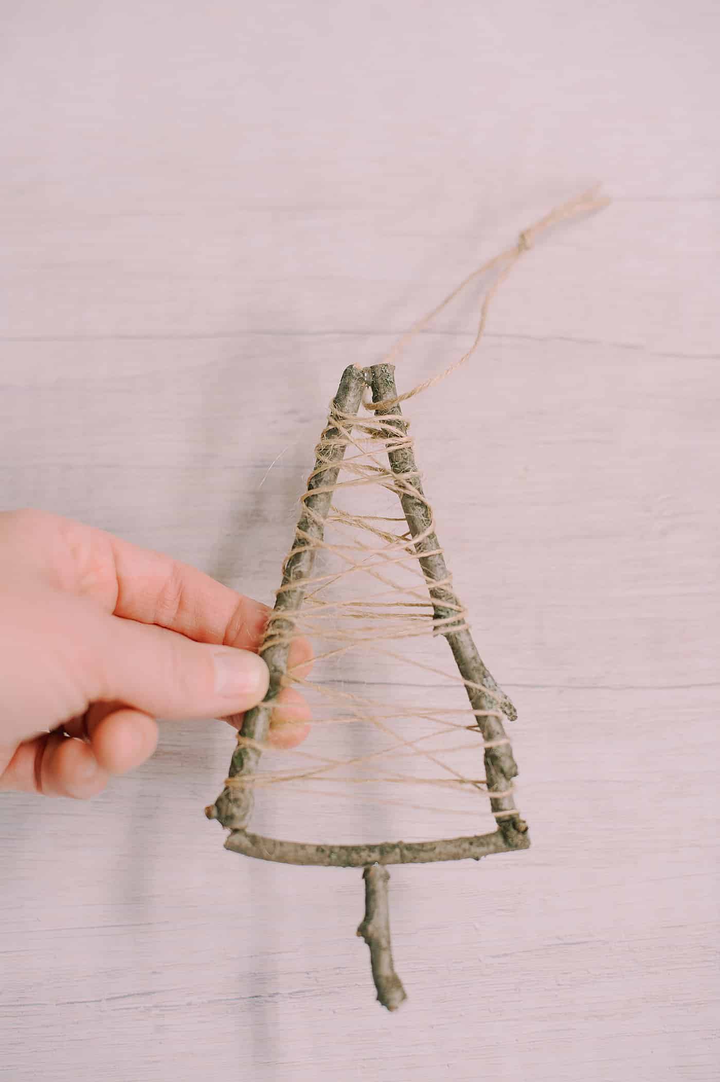 How to Make a Twine-Wrapped Stick Tree Ornament.