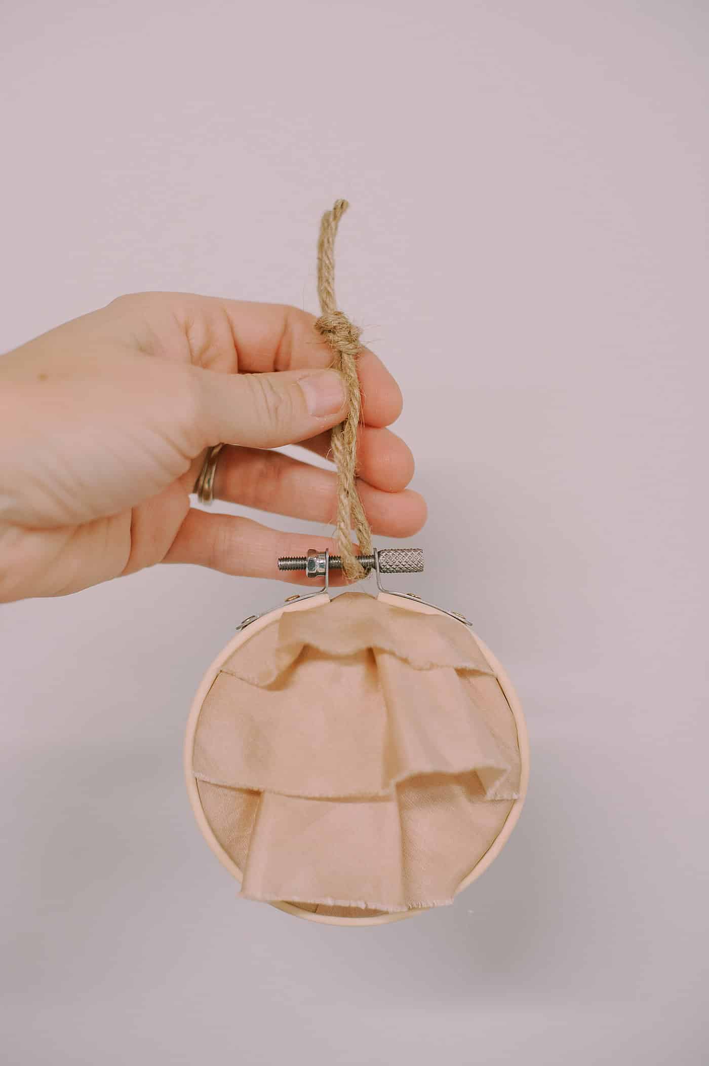 How to Make a Keepsake Memory Ornament with Fabric and Hoop.