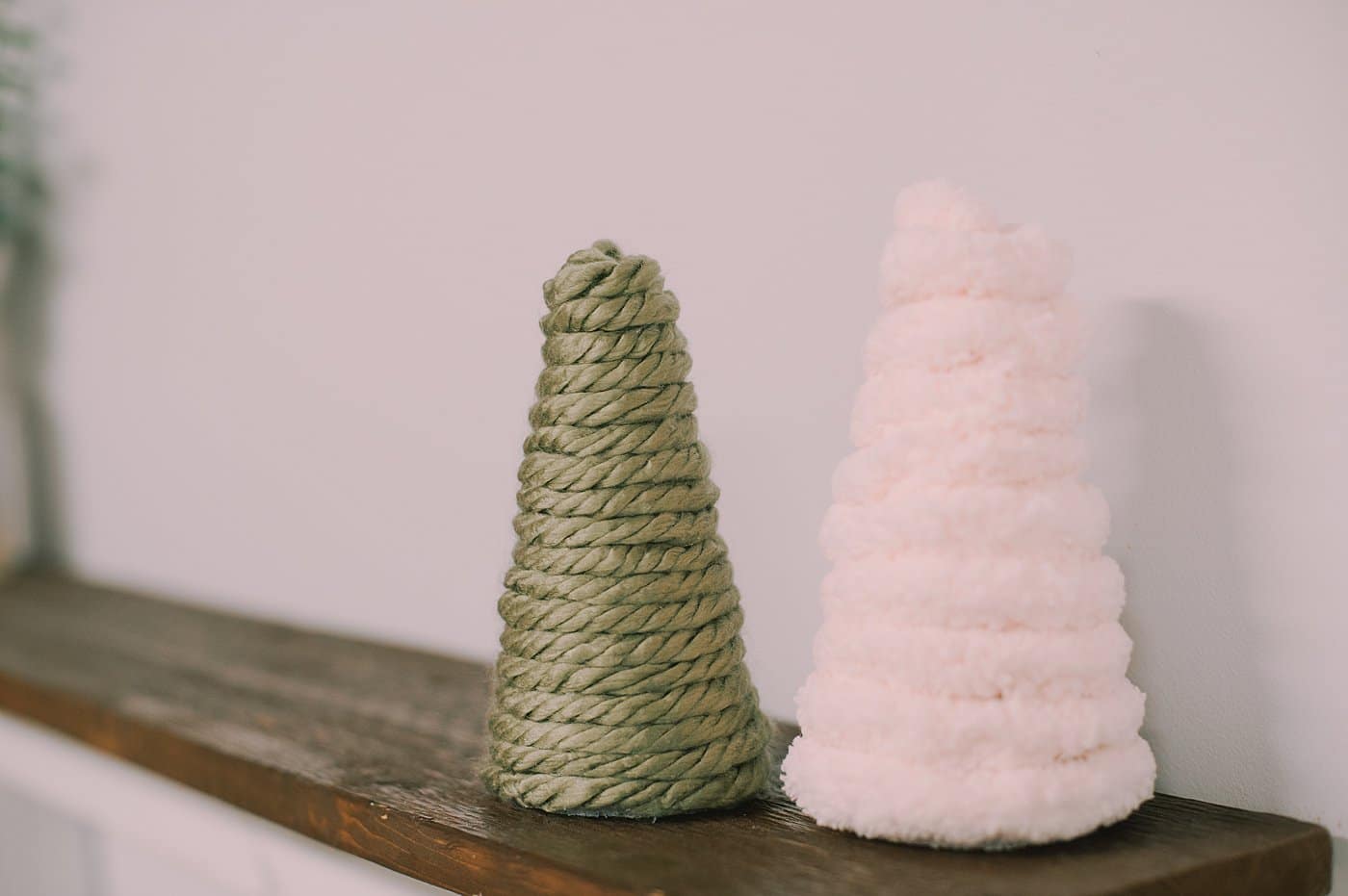 DIY chunky yarn-wrapped styrofoam Christmas tree.