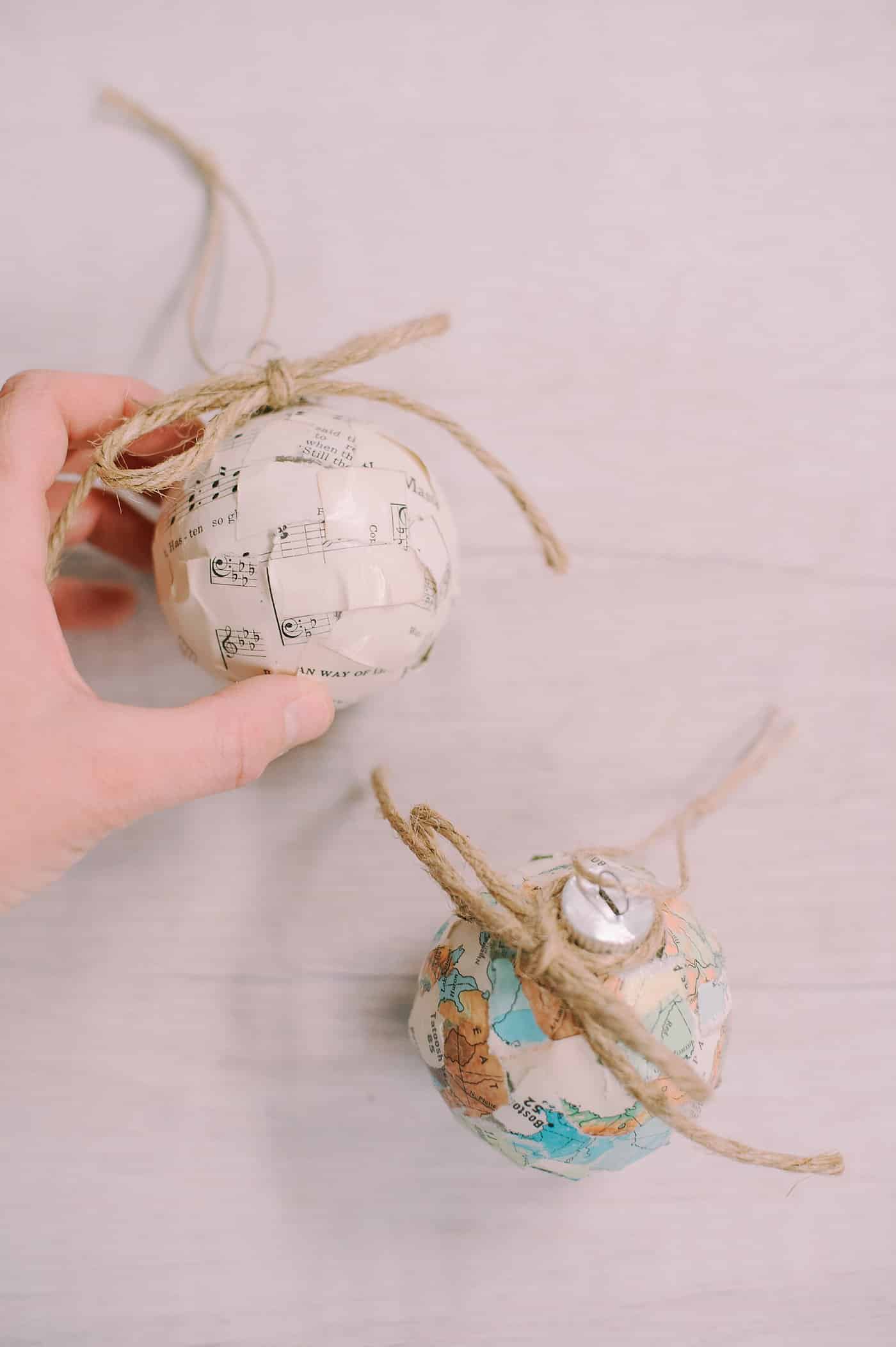 how to make christmas ornaments with mod podge and ripped up pieces of book pages or maps