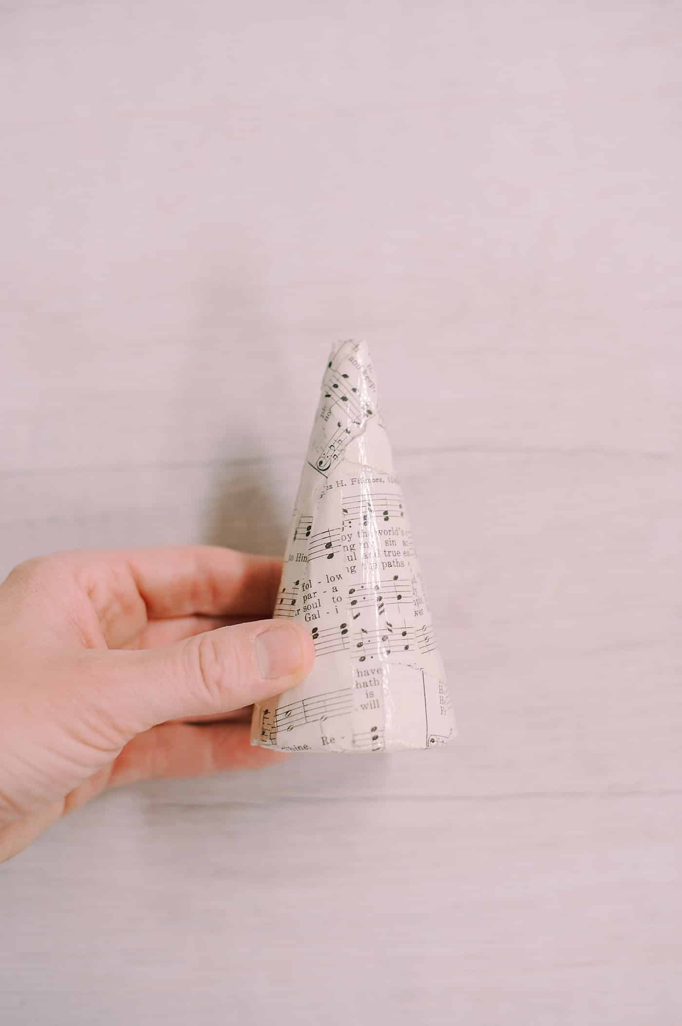 A DIY Mod Podge Book Page Cone Tree.