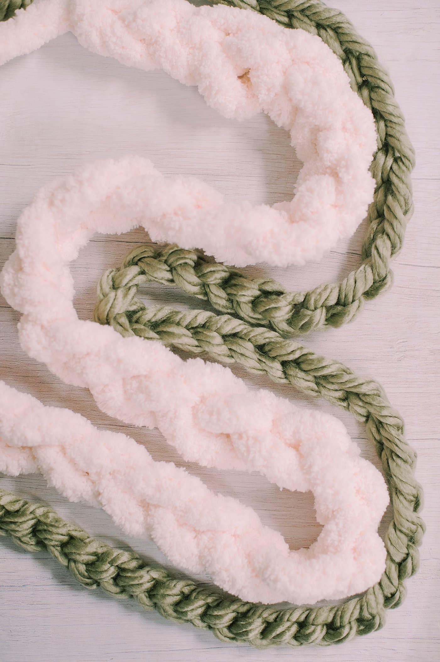DIY crochet chain stitch garland using chunky yarn.