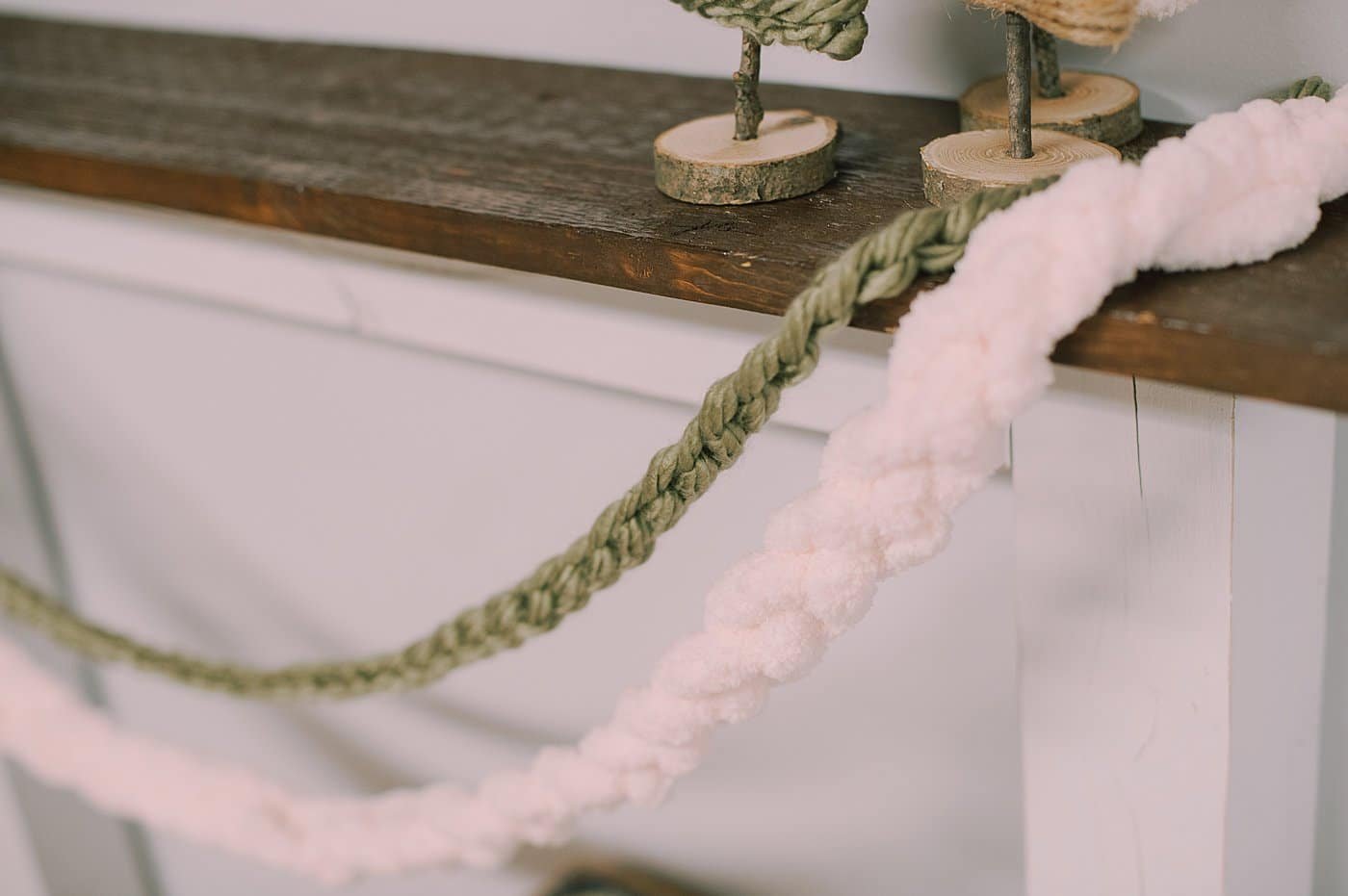 DIY crochet chain stitch garland using chunky yarn.