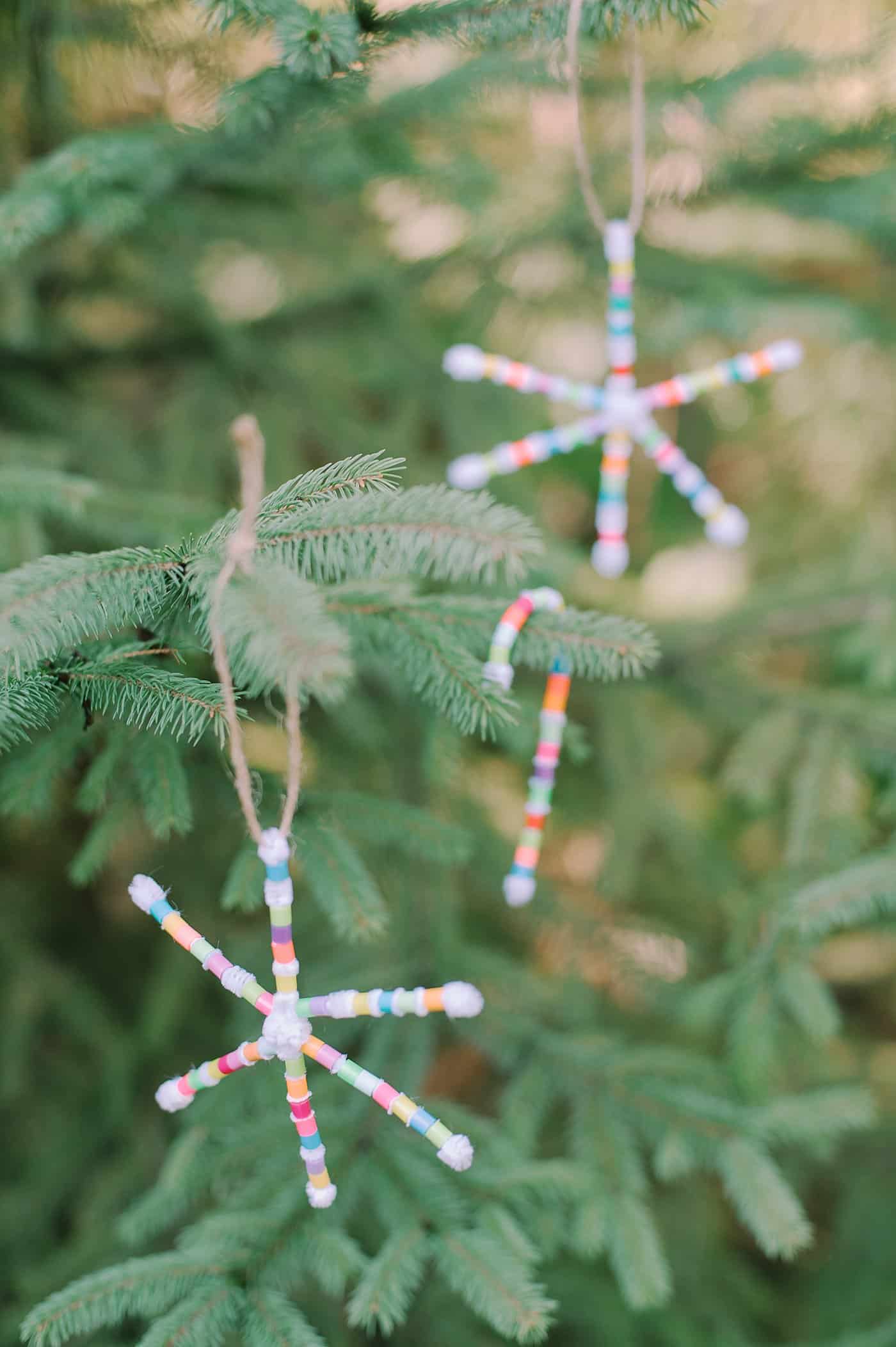 How to make perler bead pipe cleaner snowflake ornaments using white pipe cleaners and colorful perler beads.