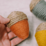 How to make DIY yarn-wrapped acorns made from plastic easter eggs