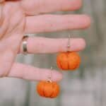 How to make DIY felt ball pumpkin earrings for fall.