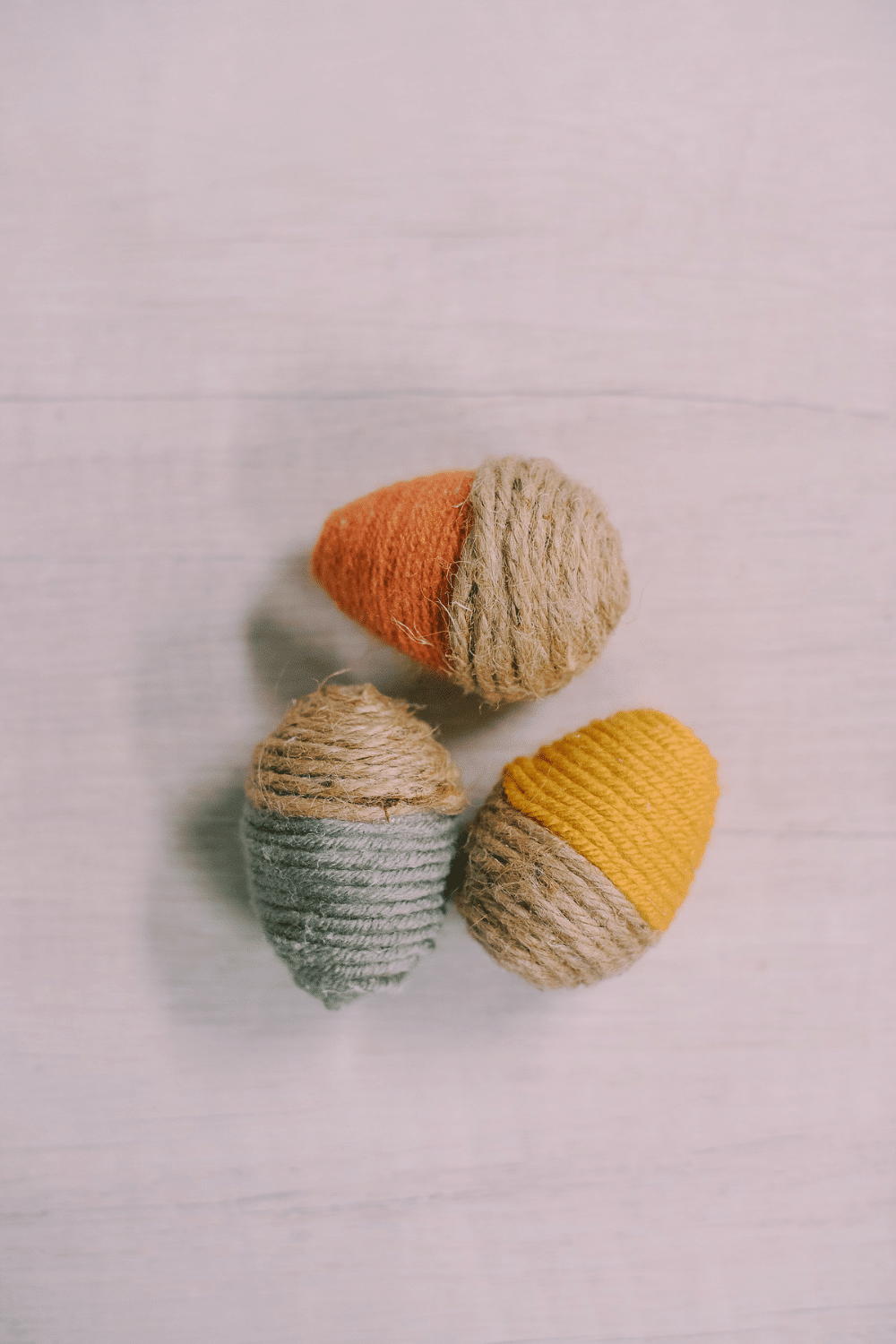 DIY Fall Acorns using Yarn-Wrapped Plastic Easter Eggs