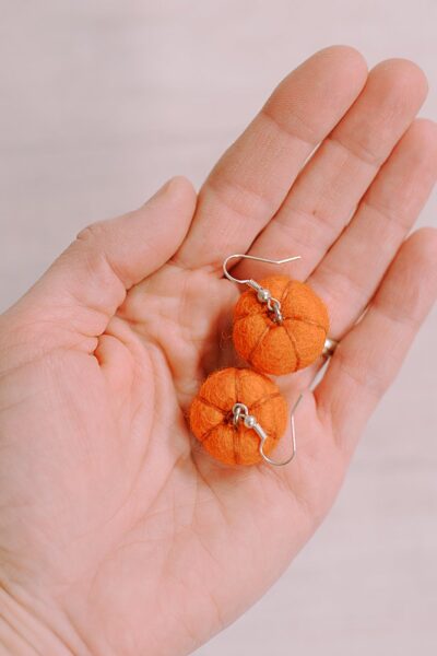 Get into the fall spirit with our step-by-step tutorial guide on crafting adorable felt ball pumpkin earrings. Learn how to create your own autumn accessories in no time!