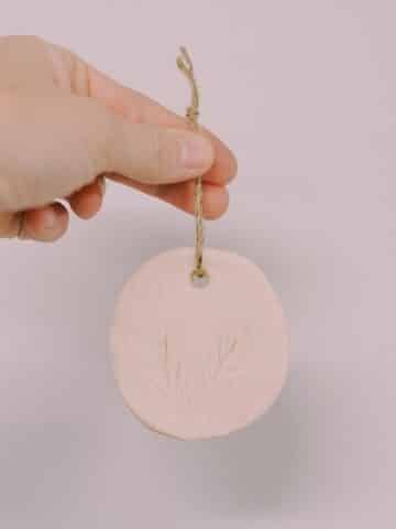Learn how to make a DIY salt dough gift tag using a simple no-fail recipe. Use it to personalize a gift, and can be used as an ornament after!