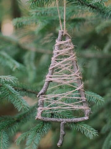 Elevate your holiday decor with a Twine-Wrapped Stick Tree Ornament. Craft it effortlessly with our step-by-step guide.
