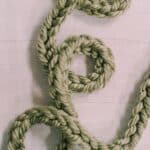 How to make a DIY finger knit yarn garland.