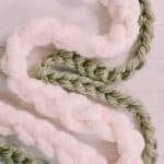 How to make a DIY chain stitch garland with chunky yarn.