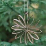 How to make flower ornaments using recycled toilet paper tubes.