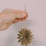 How to make flower ornaments using recycled toilet paper tubes.