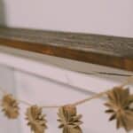 How to make a toilet paper flower garland for the mantel.