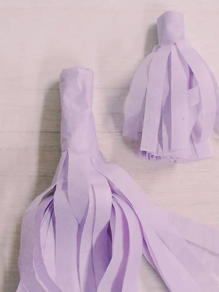 How to Make Yarn Tassels | DIY Tassel Tutorial with Yarn - Laura Radniecki