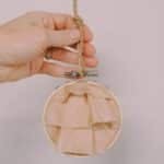 How to Make a Keepsake Memory Ornament with Fabric and Hoop.
